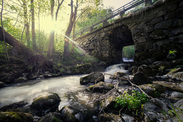 Old tunnel and water flowing through 