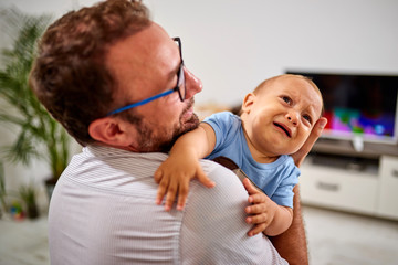 Fototapeta premium Single dad going nuts at home with a baby.