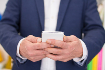 businessman using the mobile phone in the office