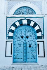 Arched Doorway with Blue Studded Door, Africa, North Africa, Tunisia, Sidi Bou Said