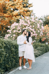 Fototapeta premium Happy couple at sunset in Rome. Wedding love story in Italy.
