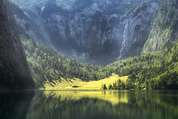  Morning sunrise view at the hintersee with röthbach waterfall bavaria national park berchtesgaden...