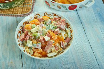Cabbage salad with ham, cucumber and corn