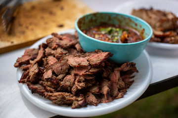 Roasted beef sliced in white dish with Thai spicy dipping sauce. Homemade cooking beef steak local thai style recipe's.