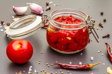 Tomato confiture, jam, chutney, sauce. Homemade preservation concept
