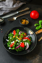 leaves mix salad, tomato, salad dressing, Healthy salad (mix micro greens, juicy snack). food background - Image