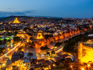 Great nocturnal view over Tbilisi and Kura river from Narikala