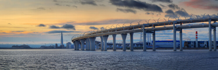Panorama of the Western high-Speed Diameter in St. Petersburg at sunset