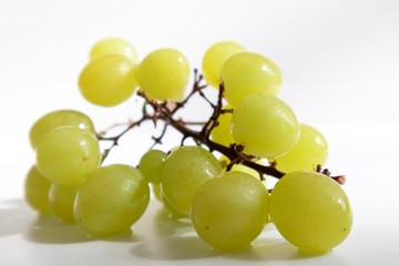 bunch of green grapes isolated on white background