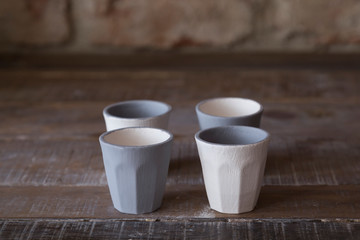 making objects with clay and tools. close up cropped photo about ceramics.