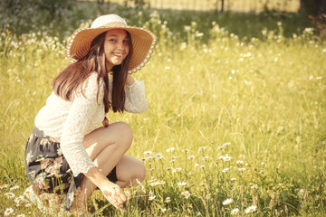 girl with camomiles