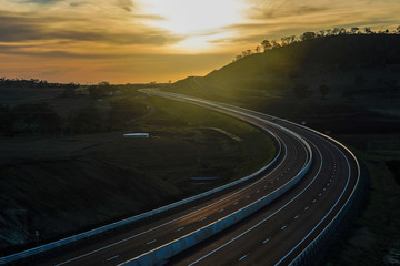 empty highway under sunset