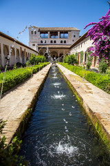 Fototapeta na wymiar Granada, Andalucia / Spain »; July 2018: The beautiful water sources of Generalife Alhambra
