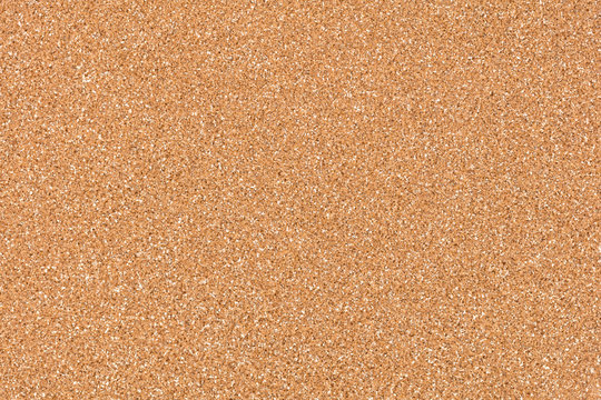Glitter background in golden tone as part of your stylish design view. High quality texture in extremely high resolution, 50 megapixels photo.