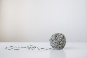 ball of wool yarn on white background