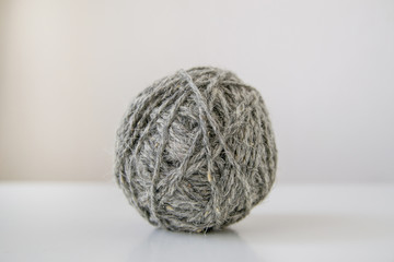 ball of wool yarn on white background