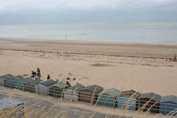 Fototapeta na wymiar Strandhäuser in England. British beach huts.