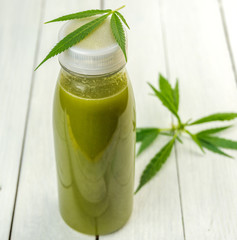 CBD Cannabis Hemp infused smoothie drink with leafs