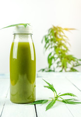 CBD Cannabis Hemp infused smoothie drink with leafs
