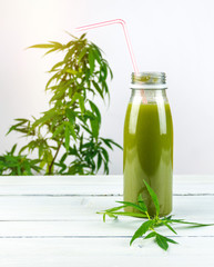 CBD Cannabis Hemp infused smoothie drink with leafs
