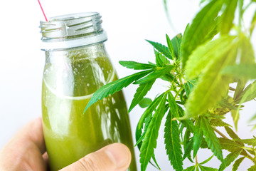 CBD Cannabis Hemp infused smoothie drink with leafs
