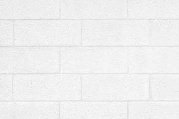 Hintergrund sehr helle Mauer aus Betonsteinen ohne Putz