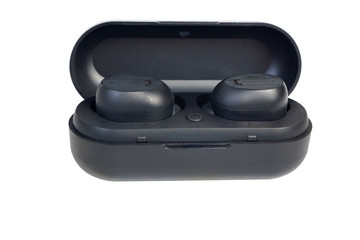 Wireless earphones.wireless headphones in the case of charging isolated on white background