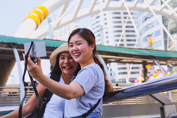 Close-up beautiful woman selfie photo smile portrait and traveling the city.