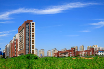 Building under the blue sky white clouds