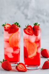 Refreshing Strawberry and lemon Iced Tea or lemonade in glasses