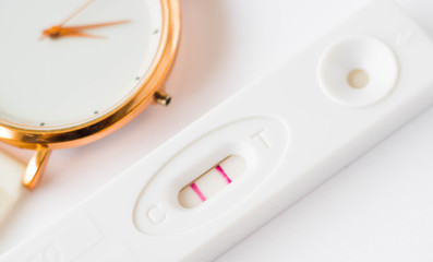 positive pregnancy test and timer
