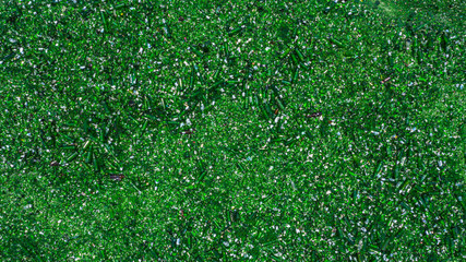 Fototapeta premium Aerial view glass bottles at the garbage dump, Recycling glass bottles.
