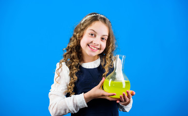 Girl school pupil study chemical liquids. School laboratory. Learn patterns of nature. Education concept. School chemistry lesson. Chemical analysis. Harmful and vital options of chemical solute