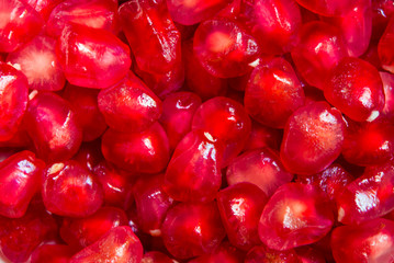 Full frame background of Pomegranate seeds as fruit background