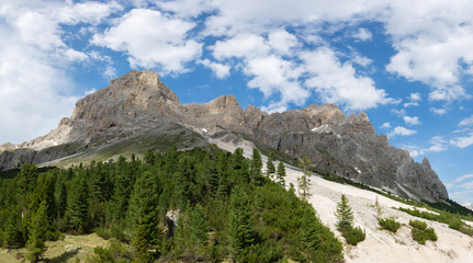 Fototapeta na wymiar Panoramic view of Rosengarten Group (Catinaccio massif) on the way to Rifugio Vajolet in Dolomites, Italy