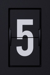 Airport mechanical flip board panel digits font 5 five