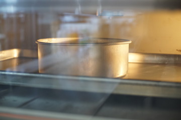 Baking cake in oven.