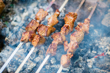 Grilled shish kebab on skewer. Roasted beef meat cooked at barbecue. Traditional eastern dish shashlik.