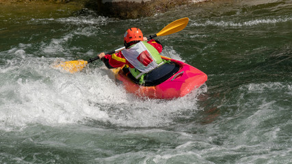 kayaker in the rapids