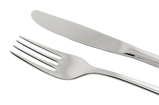 Close Up Of A Silver Knife And Fork Isolated On White Background