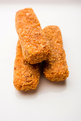 Kurkuri paneer fingers or pakora/pakoda snacks also known as Crispy Cottage Cheese Bars, served with tomato ketchup as a starter. selective focus