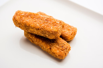 Kurkuri paneer fingers or pakora/pakoda snacks also known as Crispy Cottage Cheese Bars, served with tomato ketchup as a starter. selective focus