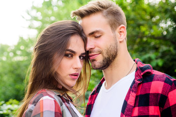 Love time. valentines day. summer camping in forest. couple in love. Hiking. man and woman in checkered shirt relax in park. family weekend. romantic date. hipster couple outdoor