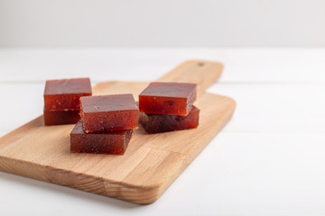 Red cubes of marmalade made from berries