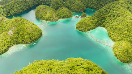 Aerial view of Sugba lagoon. Beautiful landscape with blue sea lagoon, National Park, Siargao Island, Philippines. Summer and travel vacation concept.