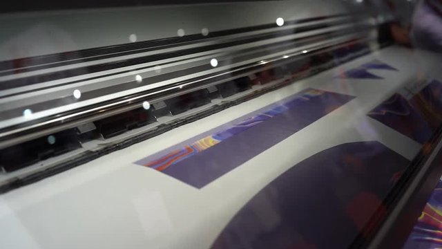 Super slow motion shot UV LED textile laser printer