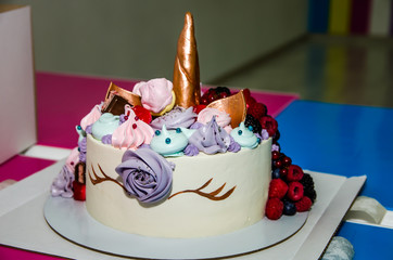 beautiful cake in the form of a unicorn on the birthday