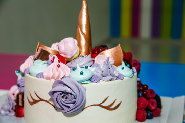 beautiful cake in the form of a unicorn on the birthday