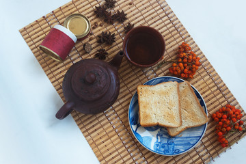 Fototapeta na wymiar Yixing teapot with accessories and spices.View from above. Candid.