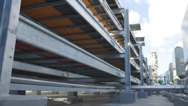 Power cable on ladder support in industrial plant 